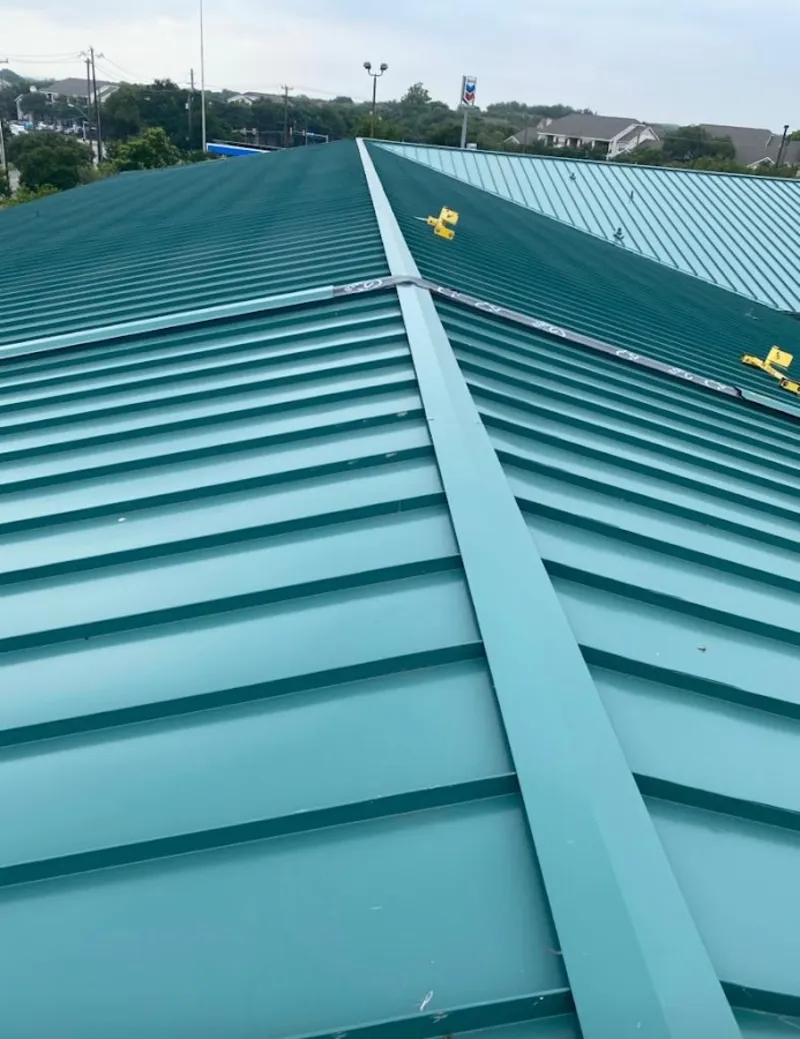 Green commercial metal roof ridge and valley for Metal Roof Repair in Stowe